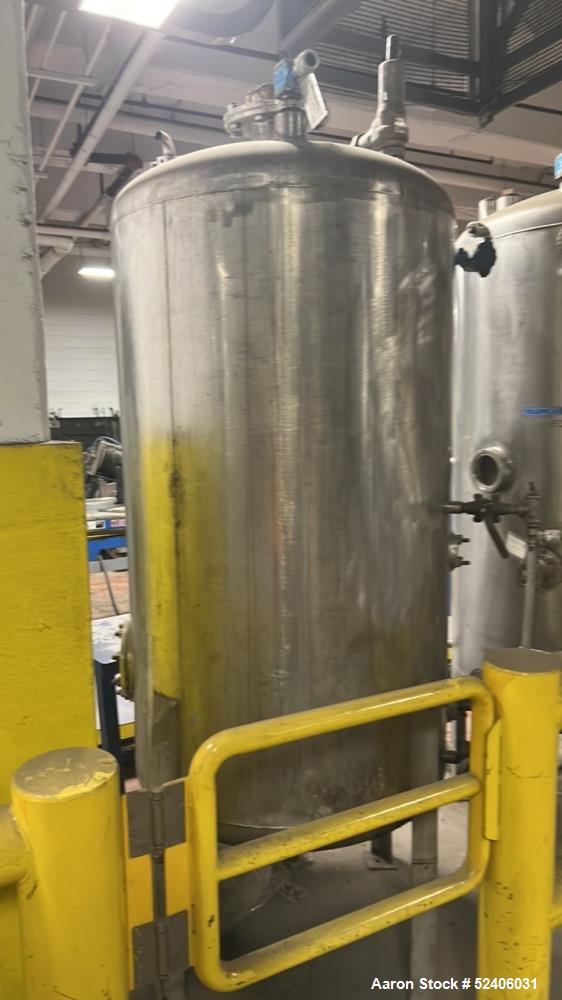 Used Alpha Stainless Tank, Approximate 250 Gallon, Stainless Steel, Vertical. Approximate 36" diameter x 57" straight side, dished top & bottom. Mounted on 4 stainless legs.