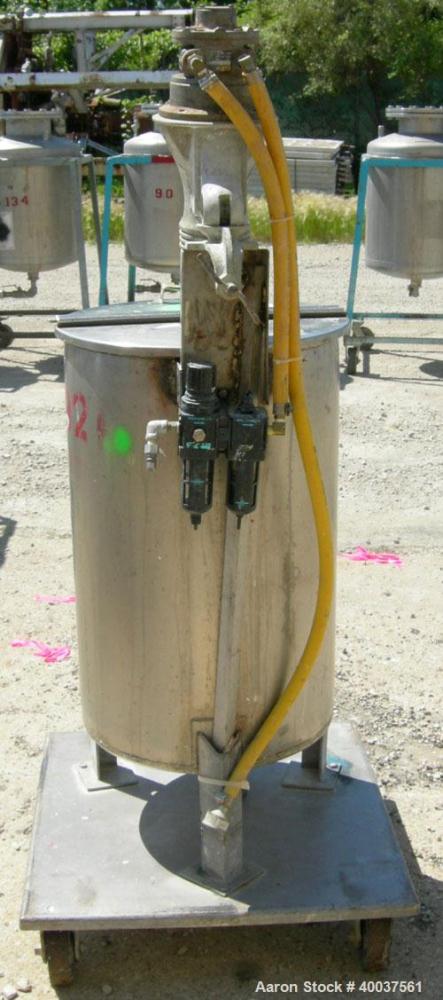 Used Alsop Tank, 25 gallon, 304 stainless steel, vertical. 18'' diameter x 28'' straight side, open top with a 1/2 hinged cover, sloped bottom. Clamp on Alsop agitator, model 25DD, 3/4'' diameter sha...
