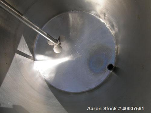 Used Alsop Tank, 25 gallon, 304 stainless steel, vertical. 18'' diameter x 28'' straight side, open top with a 1/2 hinged cover, sloped bottom. Clamp on Alsop agitator, model 25DD, 3/4'' diameter sha...