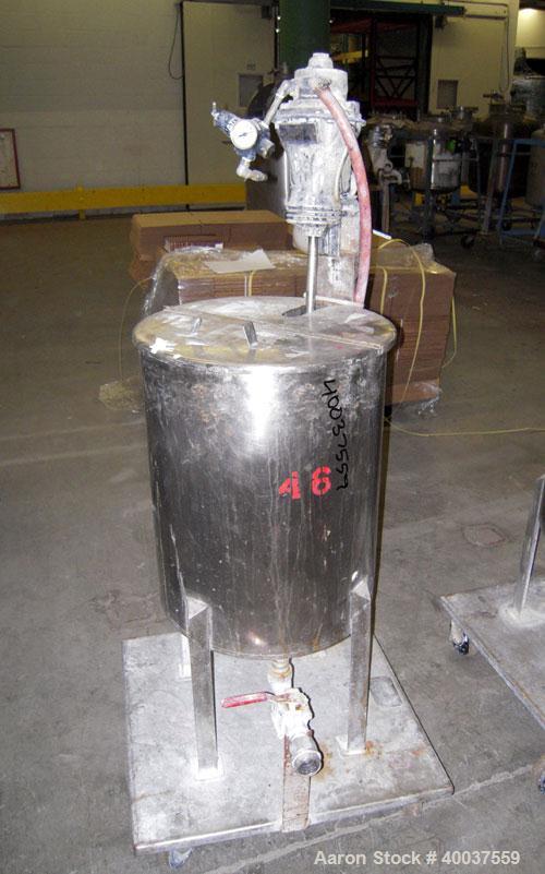 Used Alsop Tank, 25 gallon, stainless steel, vertical. 18" diameter x 22" straight side. Open top with a 1/2 hinged cover, sloped bottom. Clamp on Alsop air operated agitator, model 25DD. 3/4" diamet...