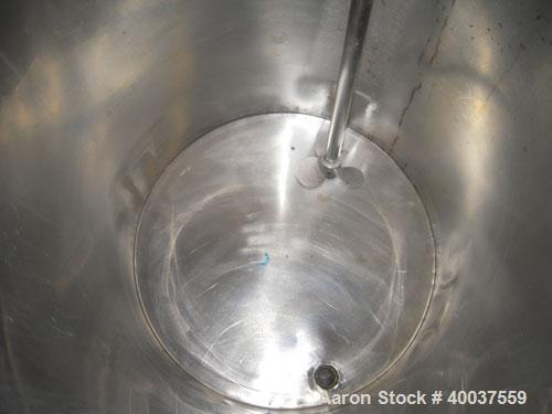 Used Alsop Tank, 25 gallon, stainless steel, vertical. 18" diameter x 22" straight side. Open top with a 1/2 hinged cover, sloped bottom. Clamp on Alsop air operated agitator, model 25DD. 3/4" diamet...