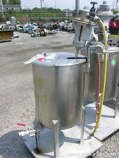 Used Alsop Tank, 25 gallon, stainless steel, vertical. 18'' diameter x 22'' straight side. Open top with a 1/2 hinged cover, sloped bottom. Clamp on Alsop air operated agitator, model 25DD. 3/4'' dia...
