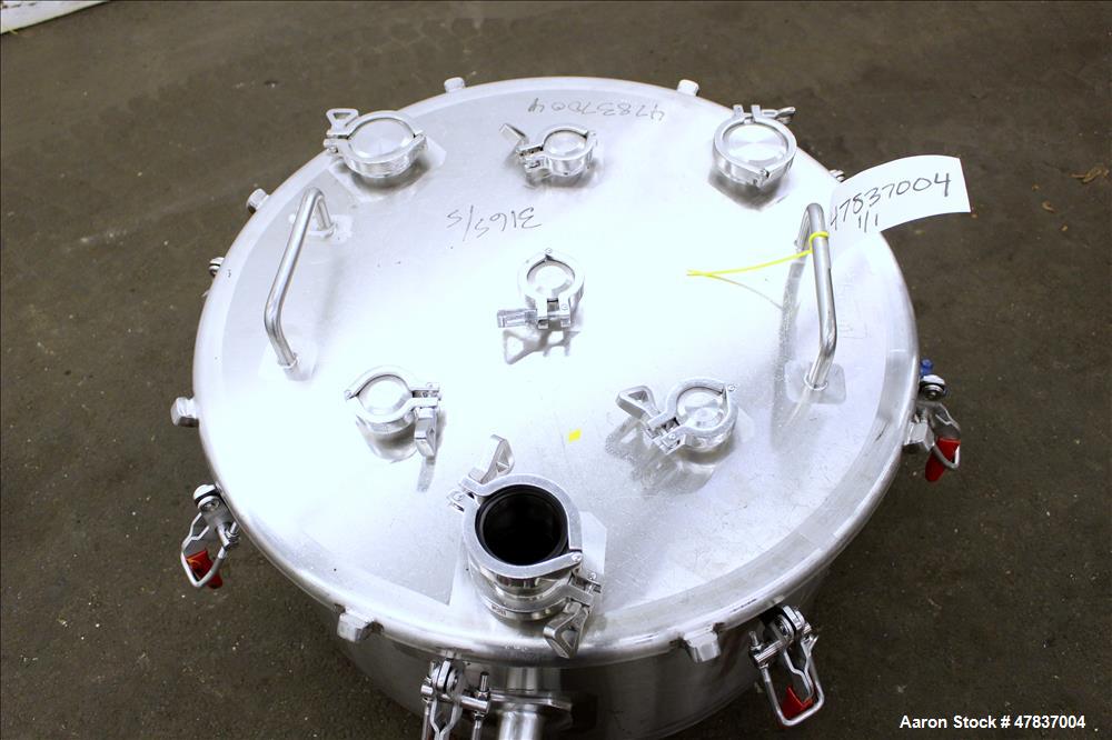 Used Bulling Metal Works Tank, 40 Gallon, 316L Stainless Steel, Vertical. 28" Diameter x 15" straight side, flat clamp on top, sloped bottom. Openings top (4) 1-1/2", (3) 2-1/4". 1-1/2" Off center bo...