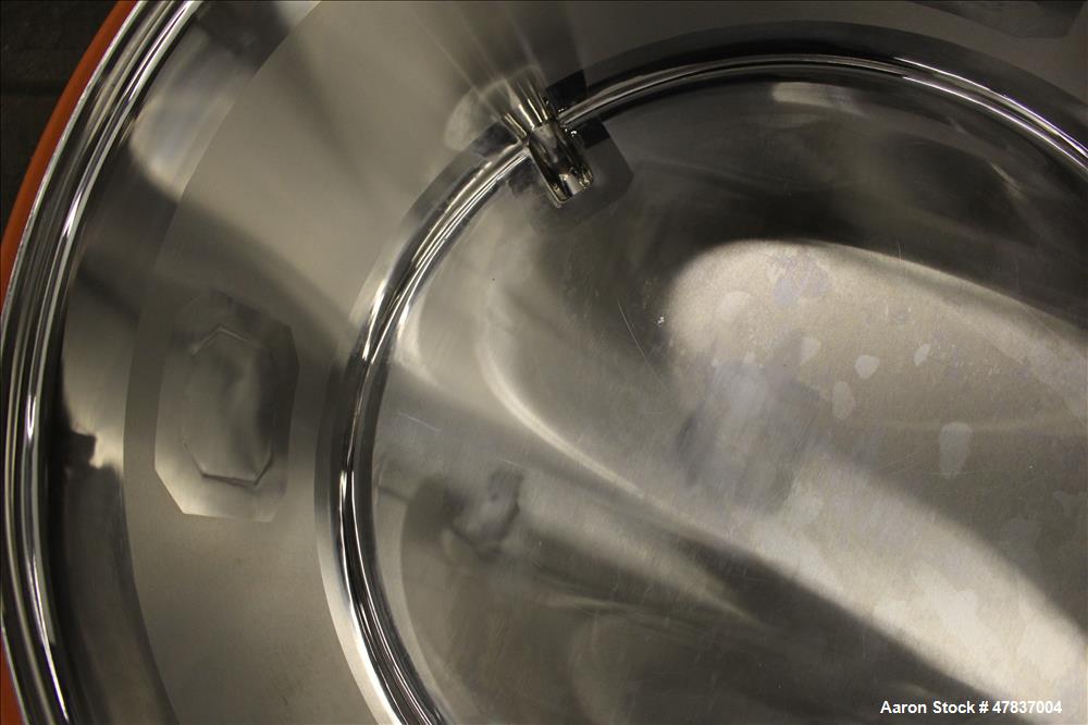 Used Bulling Metal Works Tank, 40 Gallon, 316L Stainless Steel, Vertical. 28" Diameter x 15" straight side, flat clamp on top, sloped bottom. Openings top (4) 1-1/2", (3) 2-1/4". 1-1/2" Off center bo...
