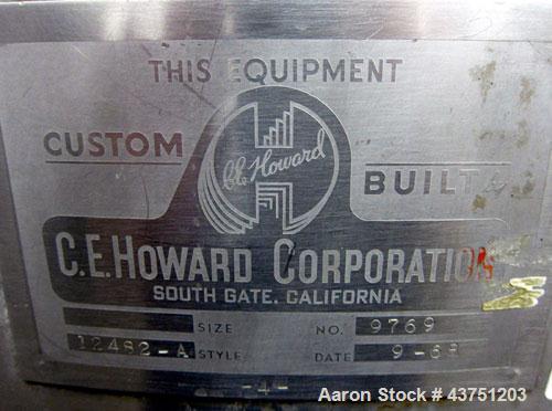 Used C.E. Howard Tank, 335 Gallon, 304 Stainless Steel, Vertical. 48" Diameter x 36" straight side. Dished top, coned bottom. Openings top 16" man way with cover. Approximate 4" center bottom outlet....