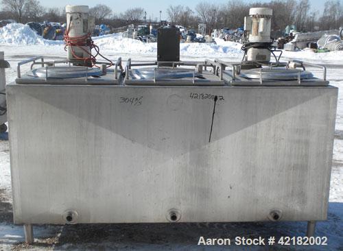 Used Cherry Burrell 3 Compartment Tank, approximately 390 total gallons, 130 gallon each compartment, model UAMS375R, 304 stainless steel, horizontal. Each compartment measures approximately 36" long...