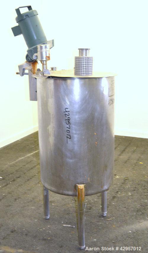 Used Cherry-Burrell Tank, 65 Gallon, 304 Stainless Steel, Vertical. 24’’ Diameter x 34’’ straight side. Open top with a 2 piece cover, sloped bottom. Lightnin clamp on agitator, model XD-30-3PH. ½’’ ...
