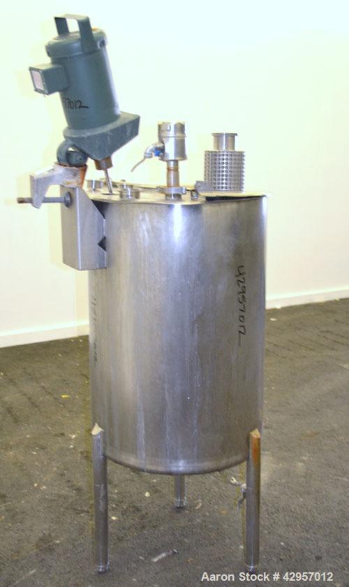 Used Cherry-Burrell Tank, 65 Gallon, 304 Stainless Steel, Vertical. 24’’ Diameter x 34’’ straight side. Open top with a 2 piece cover, sloped bottom. Lightnin clamp on agitator, model XD-30-3PH. ½’’ ...