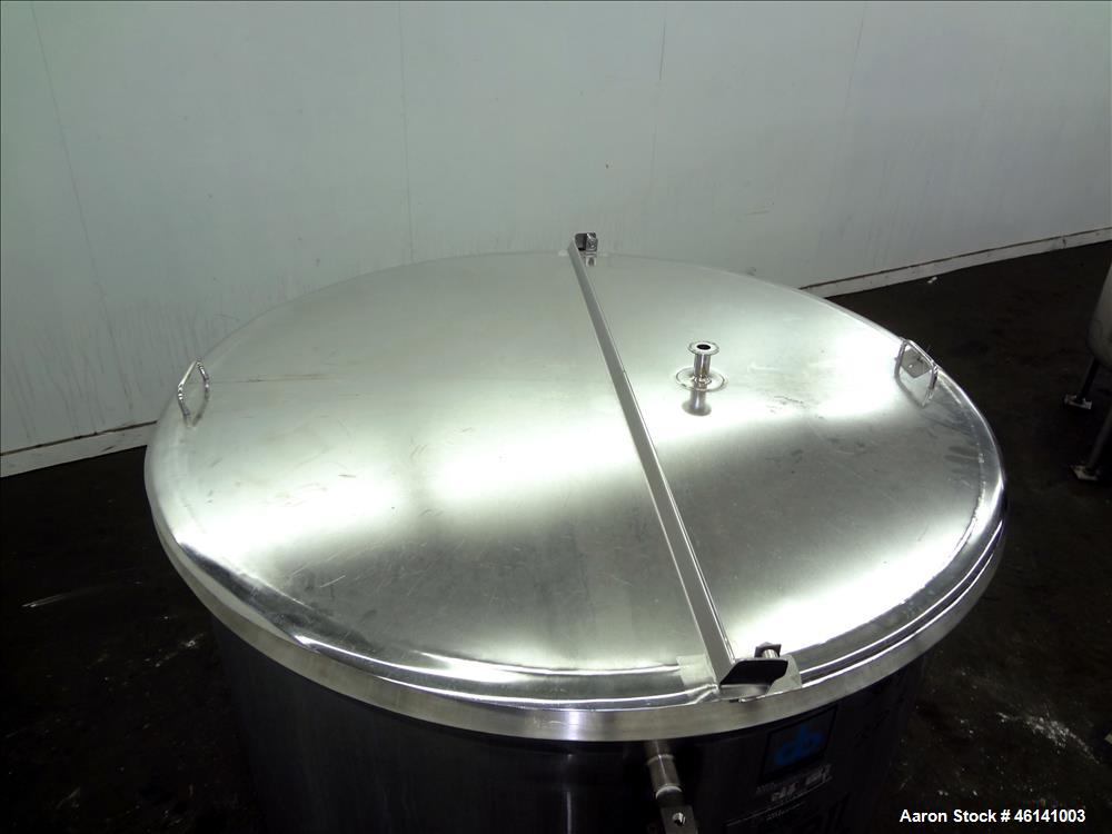 Used Cherry Burrel Tank, Approximately 300 Gallon, 304 Stainless Steel, Vertical. 48" Diameter x 40" straight side. Flat top, sloped bottom. (2) Half hinged top covers. 2" Tri clamp side bottom outle...