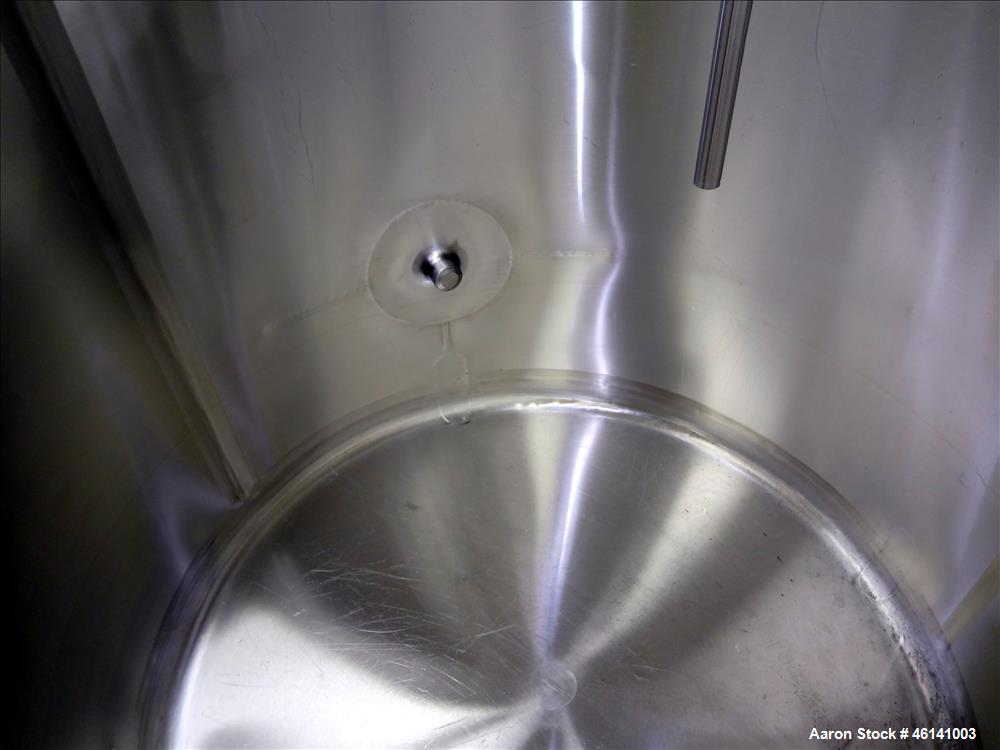 Used Cherry Burrel Tank, Approximately 300 Gallon, 304 Stainless Steel, Vertical. 48" Diameter x 40" straight side. Flat top, sloped bottom. (2) Half hinged top covers. 2" Tri clamp side bottom outle...