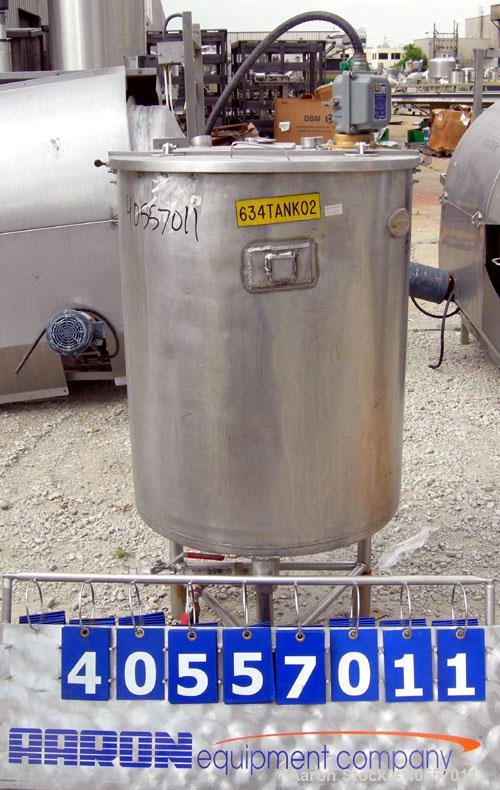 Used Coulter Tank, 75 gallon, 304 stainless steel, vertical. 26" diameter x 32" straight side, open top a 1 piece 1/3 hinged cover, coned bottom. Includes a shaft with a 3 blade prop, no drive. Appro...