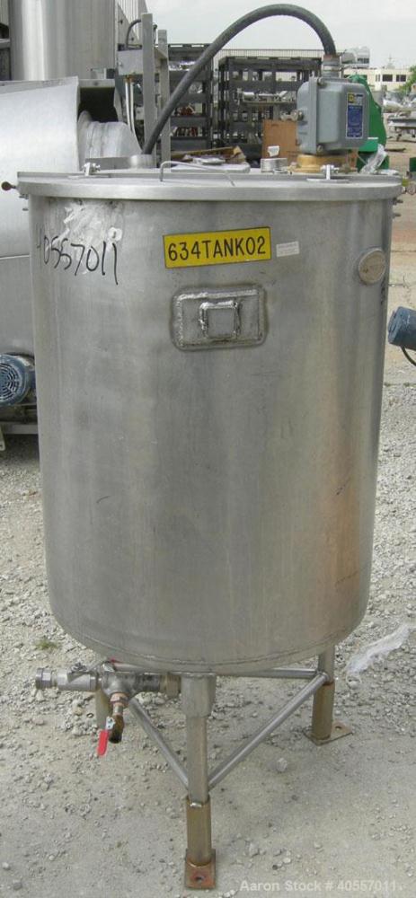 Used Coulter Tank, 75 gallon, 304 stainless steel, vertical. 26" diameter x 32" straight side, open top a 1 piece 1/3 hinged cover, coned bottom. Includes a shaft with a 3 blade prop, no drive. Appro...