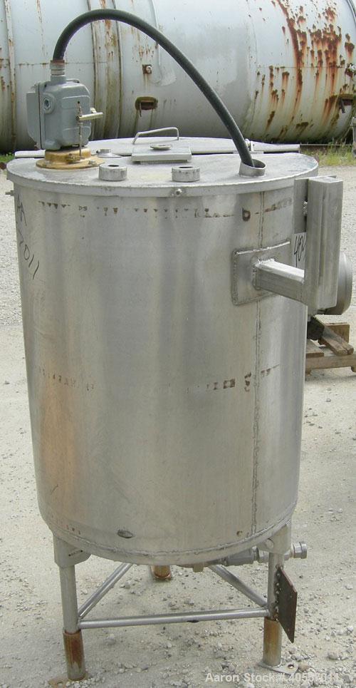 Used Coulter Tank, 75 gallon, 304 stainless steel, vertical. 26" diameter x 32" straight side, open top a 1 piece 1/3 hinged cover, coned bottom. Includes a shaft with a 3 blade prop, no drive. Appro...