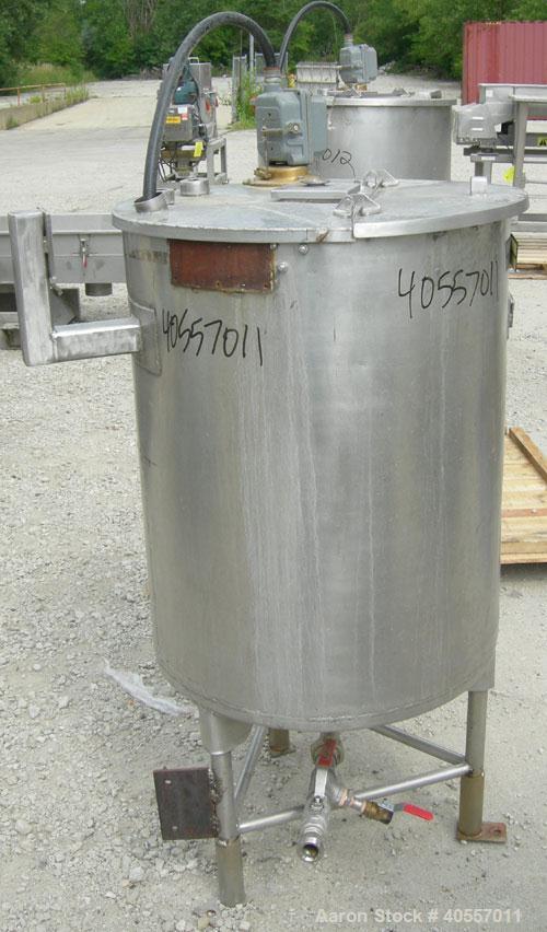 Used Coulter Tank, 75 gallon, 304 stainless steel, vertical. 26" diameter x 32" straight side, open top a 1 piece 1/3 hinged cover, coned bottom. Includes a shaft with a 3 blade prop, no drive. Appro...