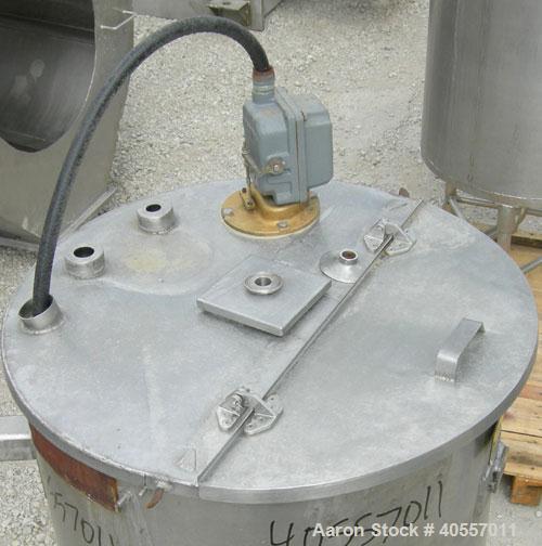Used Coulter Tank, 75 gallon, 304 stainless steel, vertical. 26" diameter x 32" straight side, open top a 1 piece 1/3 hinged cover, coned bottom. Includes a shaft with a 3 blade prop, no drive. Appro...