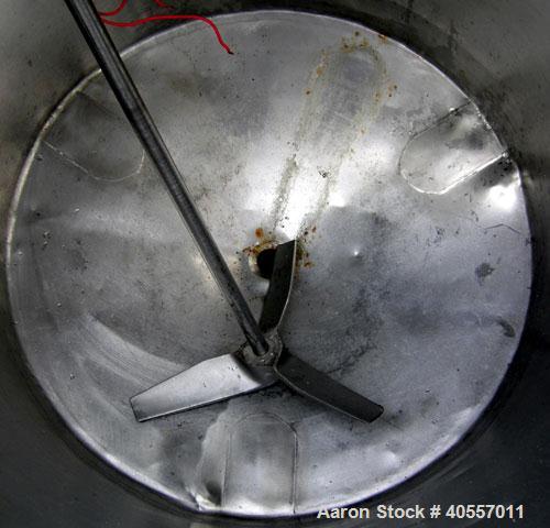 Used Coulter Tank, 75 gallon, 304 stainless steel, vertical. 26" diameter x 32" straight side, open top a 1 piece 1/3 hinged cover, coned bottom. Includes a shaft with a 3 blade prop, no drive. Appro...