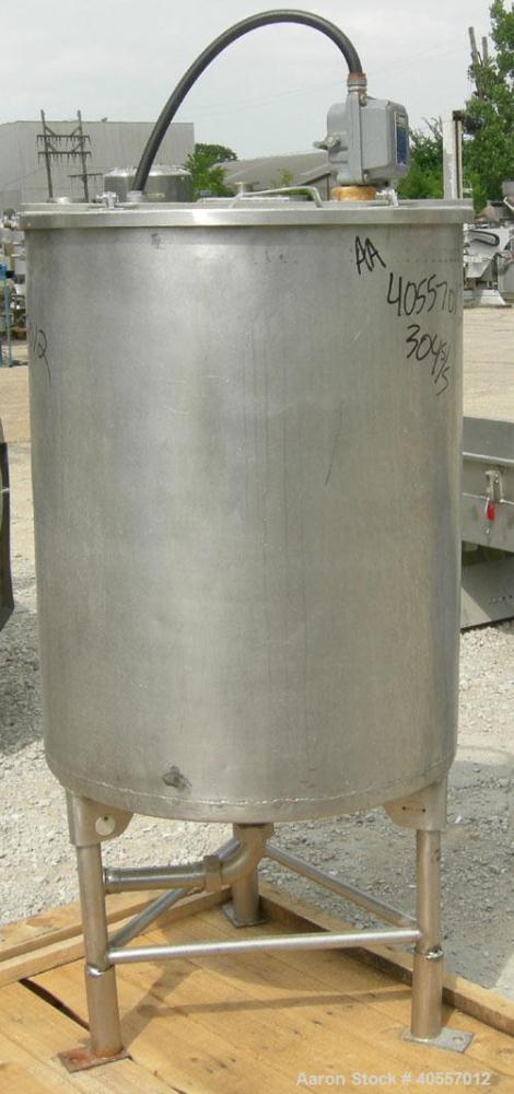 Used Coulter tank, 75 gallon, 304 stainless steel, vertical. 26" diameter x 32" straight side, open top a 1 piece 1/3 hinged cover, coned bottom. Includes a shaft with a 3 blade prop, no drive. Appro...