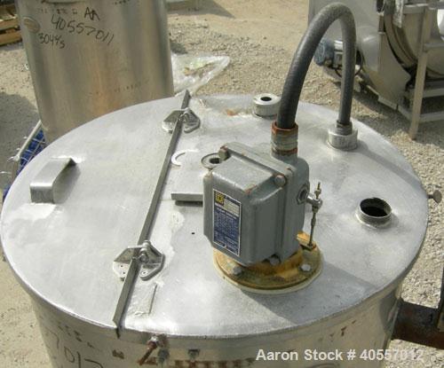 Used Coulter tank, 75 gallon, 304 stainless steel, vertical. 26" diameter x 32" straight side, open top a 1 piece 1/3 hinged cover, coned bottom. Includes a shaft with a 3 blade prop, no drive. Appro...