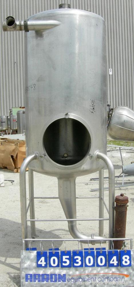 Used Creamery Package Tank, 250 gallon, 304 stainless steel, vertical. Approximately 36" diameter x 53" straight side, dished top and bottom. Openings: top (3) 2", 4"; side 2", 4"; 19" manway, no cov...