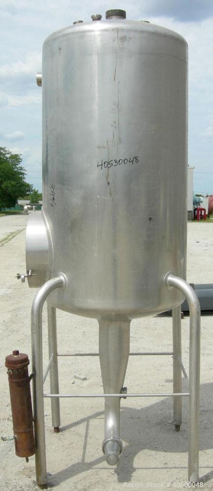 Used Creamery Package Tank, 250 gallon, 304 stainless steel, vertical. Approximately 36" diameter x 53" straight side, dished top and bottom. Openings: top (3) 2", 4"; side 2", 4"; 19" manway, no cov...