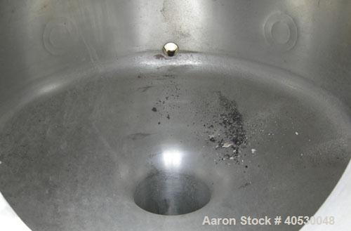 Used Creamery Package Tank, 250 gallon, 304 stainless steel, vertical. Approximately 36" diameter x 53" straight side, dished top and bottom. Openings: top (3) 2", 4"; side 2", 4"; 19" manway, no cov...