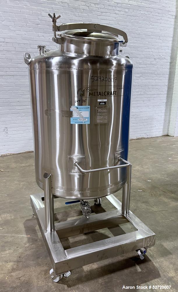 Used Custom Metalcraft Portable Tank, Approximate 150 Gallon, Model 4A07079200, 316 Stainless Steel. Approximate 36" diameter x 36" straight side, dished top & bottom. 1-1/2" Center bottom outlet wit...