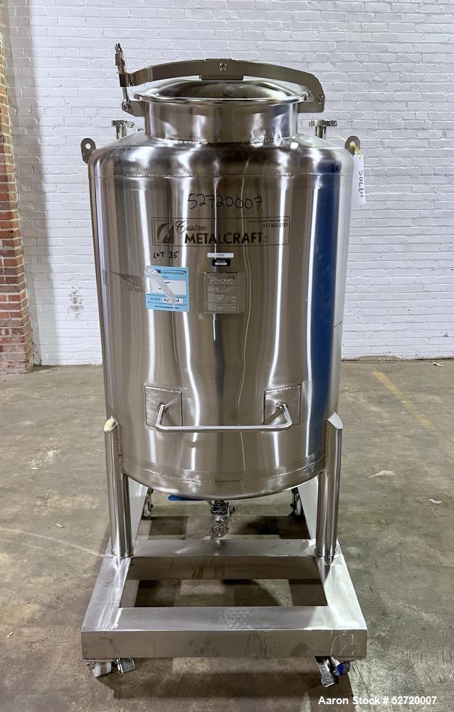 Used Custom Metalcraft Portable Tank, Approximate 150 Gallon, Model 4A07079200, 316 Stainless Steel. Approximate 36" diameter x 36" straight side, dished top & bottom. 1-1/2" Center bottom outlet wit...