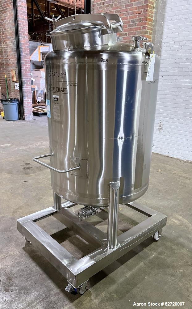 Used Custom Metalcraft Portable Tank, Approximate 150 Gallon, Model 4A07079200, 316 Stainless Steel. Approximate 36" diameter x 36" straight side, dished top & bottom. 1-1/2" Center bottom outlet wit...