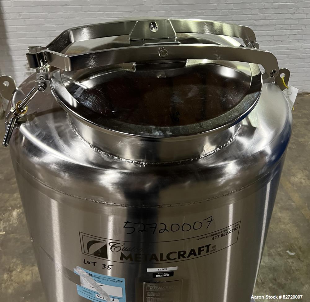 Used Custom Metalcraft Portable Tank, Approximate 150 Gallon, Model 4A07079200, 316 Stainless Steel. Approximate 36" diameter x 36" straight side, dished top & bottom. 1-1/2" Center bottom outlet wit...
