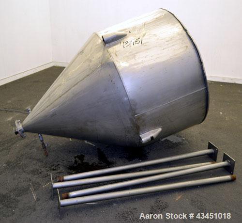 Used Custom Metalcraft Tank, 200 Gallon, 304 Stainless Steel, Vertical. 48' Diameter x 26" straight side x 44" coned bottom. Open top with a hinged cover. 3-1/2" Center bottom outlet. Mounted on 4 ca...