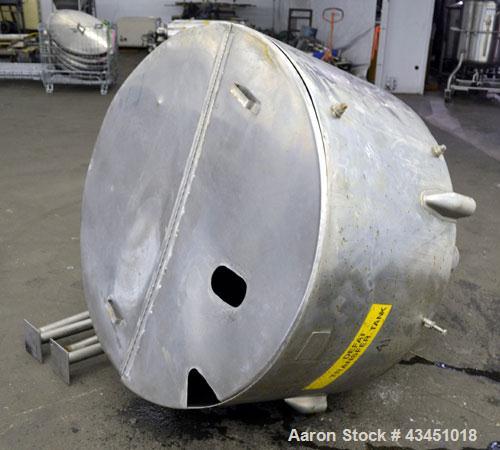 Used Custom Metalcraft Tank, 200 Gallon, 304 Stainless Steel, Vertical. 48' Diameter x 26" straight side x 44" coned bottom. Open top with a hinged cover. 3-1/2" Center bottom outlet. Mounted on 4 ca...