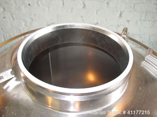 Used DCI Pressure Tank, 300 Liter (79 Gallon), 316L stainless steel, vertical. 29-3/4" diameter x 24" straight side, dished top and bottom. 240 grit with electro-polished internal rated 30 psi at 300...