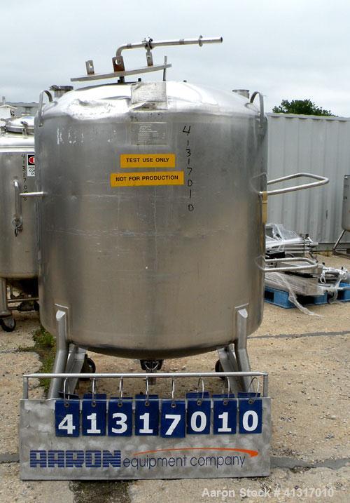 Used DCI Pressure Tank, 211 Gallon, 316 Stainless Steel, Vertical. 43 1/4" diameter x 37" straight side, dished top and bottom. 180 grit finished internal rated 50 psi at 300 deg.f.. Insulated with 2...