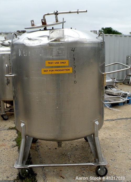 Used DCI Pressure Tank, 211 Gallon, 316 Stainless Steel, Vertical. 43 1/4" diameter x 37" straight side, dished top and bottom. 180 grit finished internal rated 50 psi at 300 deg.f.. Insulated with 2...