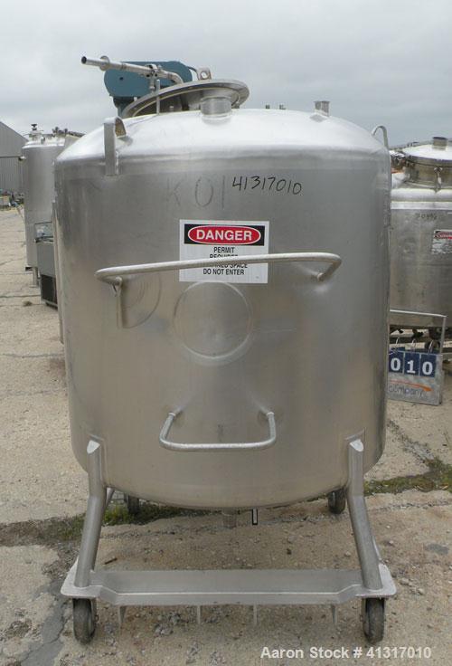 Used DCI Pressure Tank, 211 Gallon, 316 Stainless Steel, Vertical. 43 1/4" diameter x 37" straight side, dished top and bottom. 180 grit finished internal rated 50 psi at 300 deg.f.. Insulated with 2...