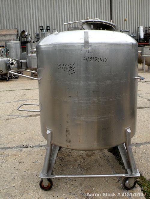 Used DCI Pressure Tank, 211 Gallon, 316 Stainless Steel, Vertical. 43 1/4" diameter x 37" straight side, dished top and bottom. 180 grit finished internal rated 50 psi at 300 deg.f.. Insulated with 2...