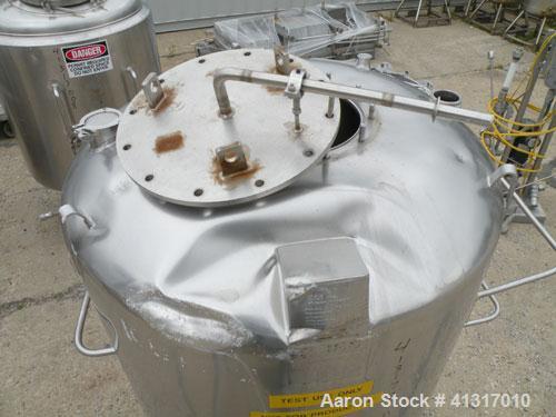 Used DCI Pressure Tank, 211 Gallon, 316 Stainless Steel, Vertical. 43 1/4" diameter x 37" straight side, dished top and bottom. 180 grit finished internal rated 50 psi at 300 deg.f.. Insulated with 2...