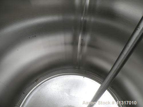 Used DCI Pressure Tank, 211 Gallon, 316 Stainless Steel, Vertical. 43 1/4" diameter x 37" straight side, dished top and bottom. 180 grit finished internal rated 50 psi at 300 deg.f.. Insulated with 2...