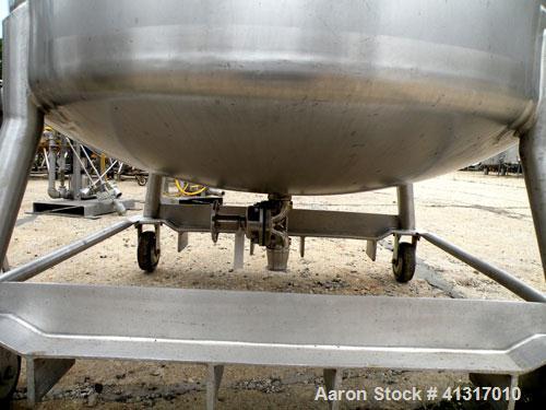 Used DCI Pressure Tank, 211 Gallon, 316 Stainless Steel, Vertical. 43 1/4" diameter x 37" straight side, dished top and bottom. 180 grit finished internal rated 50 psi at 300 deg.f.. Insulated with 2...