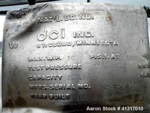 Used DCI Pressure Tank, 211 Gallon, 316 Stainless Steel, Vertical. 43 1/4" diameter x 37" straight side, dished top and bottom. 180 grit finished internal rated 50 psi at 300 deg.f.. Insulated with 2...