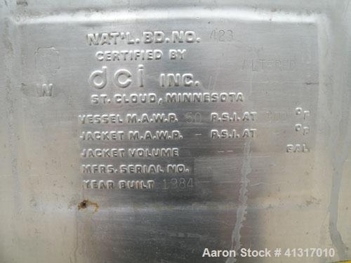 Used DCI Pressure Tank, 211 Gallon, 316 Stainless Steel, Vertical. 43 1/4" diameter x 37" straight side, dished top and bottom. 180 grit finished internal rated 50 psi at 300 deg.f.. Insulated with 2...