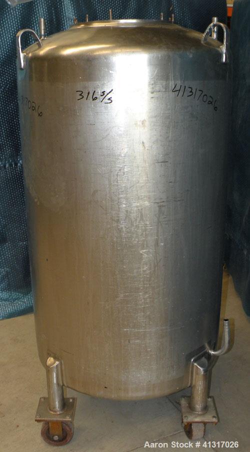 Used DCI Pressure Tank, 150 Gallon, 316L Stainless Steel, Vertical. 30" diameter x 44" straight side. Dish top and bottom. Internal rated 25 psi at 200 deg F. Openings: top  12" manway, no cover, (2)...