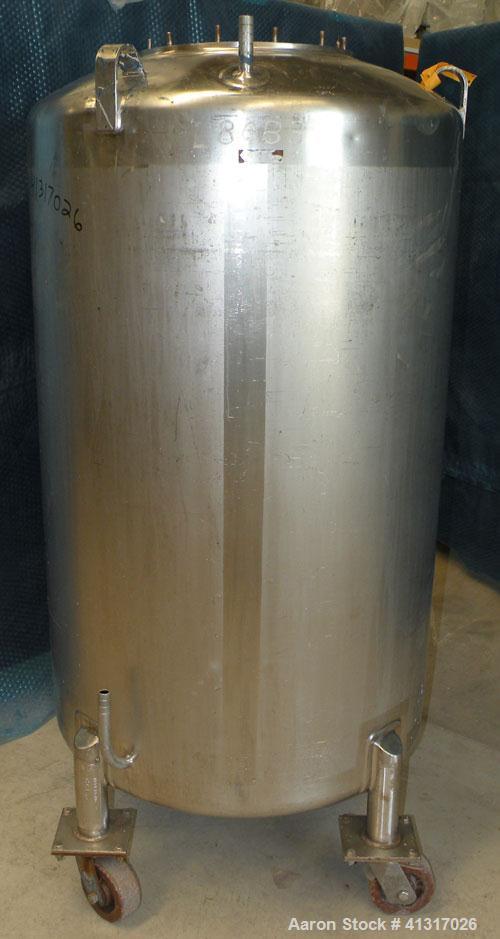 Used DCI Pressure Tank, 150 Gallon, 316L Stainless Steel, Vertical. 30" diameter x 44" straight side. Dish top and bottom. Internal rated 25 psi at 200 deg F. Openings: top  12" manway, no cover, (2)...