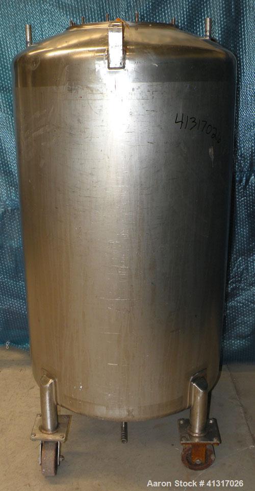 Used DCI Pressure Tank, 150 Gallon, 316L Stainless Steel, Vertical. 30" diameter x 44" straight side. Dish top and bottom. Internal rated 25 psi at 200 deg F. Openings: top  12" manway, no cover, (2)...