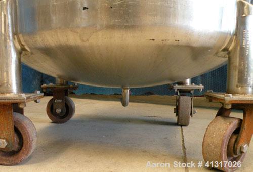 Used DCI Pressure Tank, 150 Gallon, 316L Stainless Steel, Vertical. 30" diameter x 44" straight side. Dish top and bottom. Internal rated 25 psi at 200 deg F. Openings: top  12" manway, no cover, (2)...