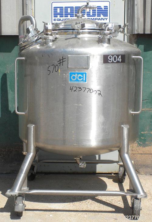 Used DCI Pressure Tank, 184 Gallon, 316L stainless steel, vertical. 41-3/4" Diameter x 26" straight side, dish top and bottom. Internal rated +35/-15 psi @ 284 degrees F. Internal CIP spray ball. Ope...