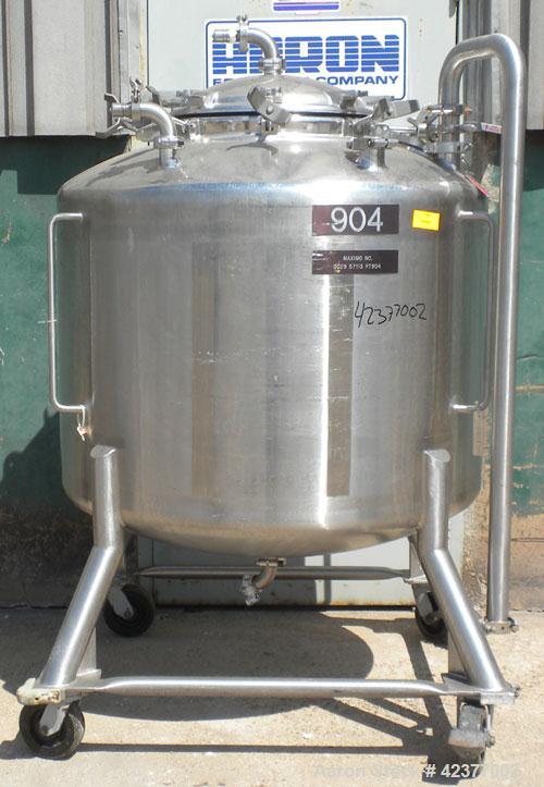Used DCI Pressure Tank, 184 Gallon, 316L stainless steel, vertical. 41-3/4" Diameter x 26" straight side, dish top and bottom. Internal rated +35/-15 psi @ 284 degrees F. Internal CIP spray ball. Ope...