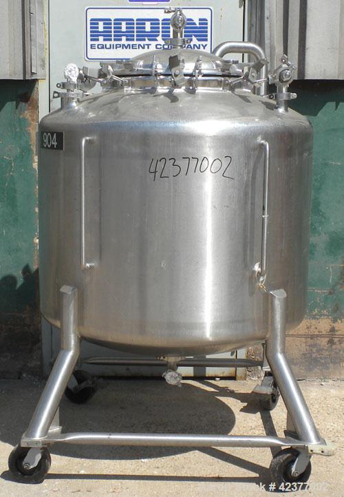 Used DCI Pressure Tank, 184 Gallon, 316L stainless steel, vertical. 41-3/4" Diameter x 26" straight side, dish top and bottom. Internal rated +35/-15 psi @ 284 degrees F. Internal CIP spray ball. Ope...