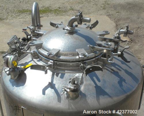 Used DCI Pressure Tank, 184 Gallon, 316L stainless steel, vertical. 41-3/4" Diameter x 26" straight side, dish top and bottom. Internal rated +35/-15 psi @ 284 degrees F. Internal CIP spray ball. Ope...