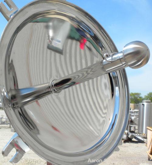 Used DCI Pressure Tank, 184 Gallon, 316L stainless steel, vertical. 41-3/4" Diameter x 26" straight side, dish top and bottom. Internal rated +35/-15 psi @ 284 degrees F. Internal CIP spray ball. Ope...